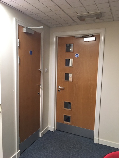 Doorway to main area + coats